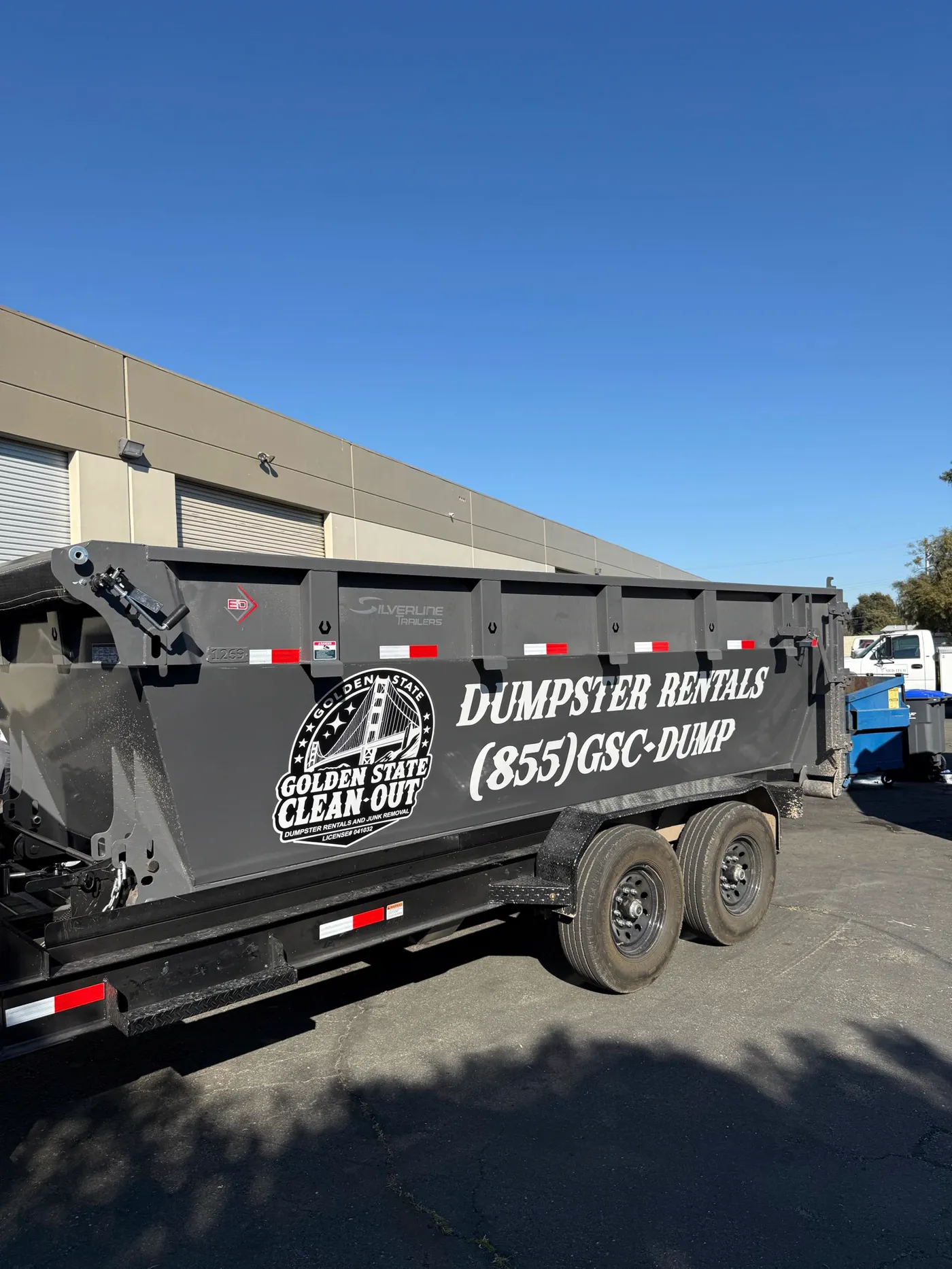 Golden State Cleanout 16-yard roll-off dumpster with company branding